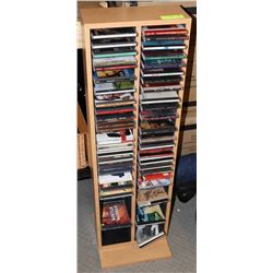CD SHELF WITH ASSORTED CDS.