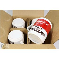 NEW SET OF 4 CARNATION HOT CHOCOLATE CUPS.
