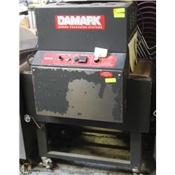 DAMARK HEAT SHRINK TUNNEL PACKAGING SYSTEM