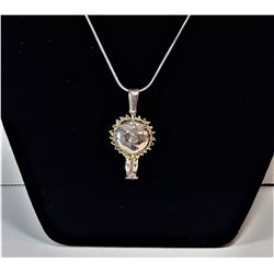 18)  SILVER SUN FACE PENDANT WITH GOLD TONE