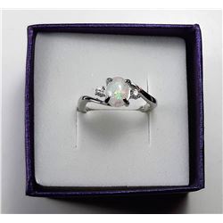 6)  WHITE FIREOVAL OPAL WITH CRYSTAL