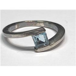 142) STERLING SILVER BLUE TOPAZ RING