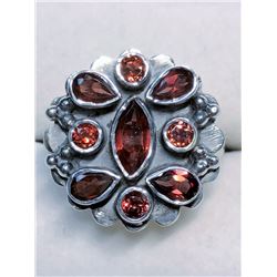 185) STERLING SILVER 9 GARNET RING
