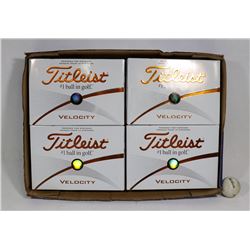 FLAT OF TITLEIST VELOCITY RECLAIMED GOLF BALLS.