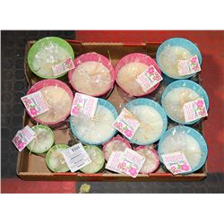 LOT OF CITRONELLA CANDLES IN POTS.