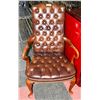 Image 1 : LEATHER AND WOOD ARMCHAIR. FURNITURE