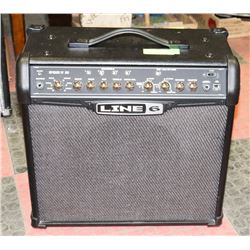 LINE 6 GUITAR 75 WATT AMP WITH FENDER COVER.