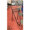 Image 1 : BLACK WROUGHT IRON WHEELED CULTIVATOR PLANT