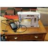 Image 2 : SINGER SEWING MACHINE WITH CABINET AND STOOL