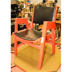 ORANGE AND BLACK ARMCHAIR