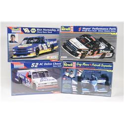LOT OF 4 MODEL CARS IN BOX.