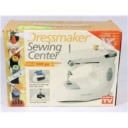 DRESSMAKER SEWING MACHINE IN BOX.
