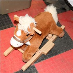 KIDS ROCKING HORSE WITH SOUND.