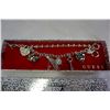 Image 2 : NEW IN BOX GUESS SILVER BRACELET W/ 8 CHARMS