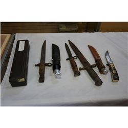 LOT OF 3 BAYONETS AND 3 BUCK KNIVES AND SHARPENING STONE