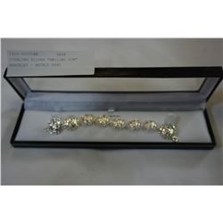 STERLING SILVER "SMILING SUN" BRACELET - RETAIL $440