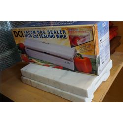 2 MARBLE SLABS AND VACUUM SEALER