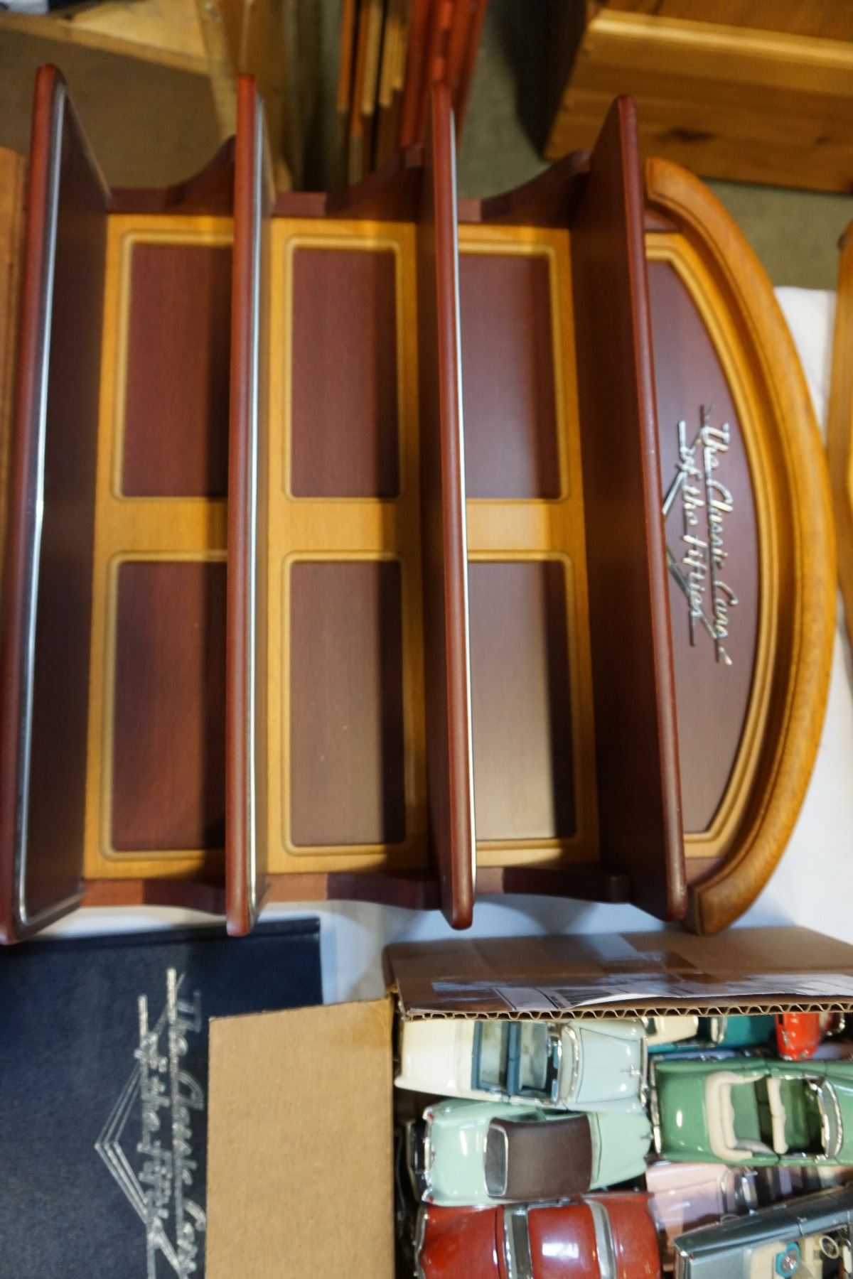 BOX LOT OF 50s AND 60s DIE CAST CARS W/ DISPLAY RACKS