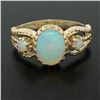 Image 1 : 14k Yellow Gold Prong Set Fiery Oval & Round Cabochon Opal Split Shank Band Ring