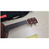 Image 4 : Makala 4 String Ukulele w/ Case