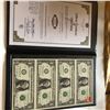 Image 1 : 2009 Uncut Sheet of 4 1 Dollar US Bills in Leather Binder with COA