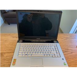 Toshiba Satelite Lap Top with charger ( sold as is, un tested )