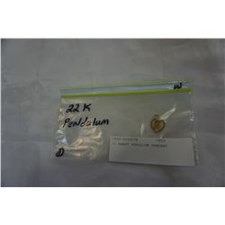 22 KARAT PENDULUM PENDANT