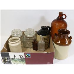 BOX OF COLLECTIBLE POTTERY JUGS AND COLORED