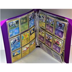 21)  LOT OF 156 POKÉMON CARDS IN A BINDER