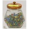 Image 1 : GLASS CANNISTER W/VINTAGE MARBLES. COLLECTIBLES