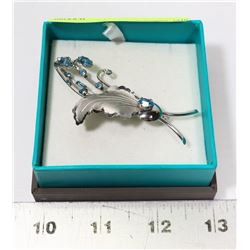 STERLING SILVER AND RHINESTONE BROOCH