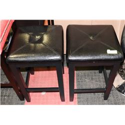 PAIR OF SHOWHOME BLACK LEATHERETTE STOOLS