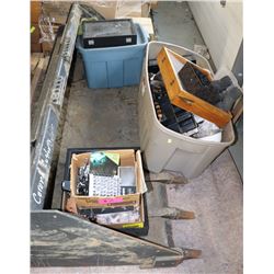 BOBCAT BUCKET FILLED WITH ASSORTED MERCHANDISE