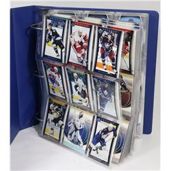 BINDER OF OVER 300 UPPER DECK TRILOGY HOCKEY CARDS