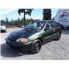Image 1 : A10 --  1999 PONTIAC FIREFLY , Green , 223900  KM's "NO RESERVE"