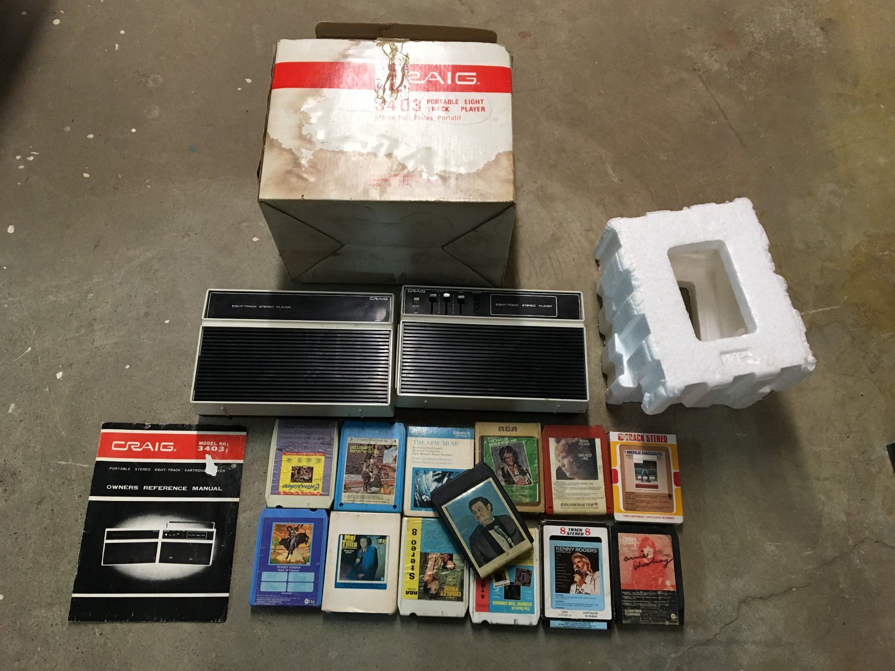 PORTABLE EIGHT TRACK PLAYER AND COLLECTION OF 8-TRACK TAPES (CRAIG)