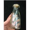 Image 1 : EMBOSSED SASKATCHEWAN COOPERATIVE CREAMERIES ADVERTISING MILK BOTTLE (1/2 PINT) *VINTAGE*