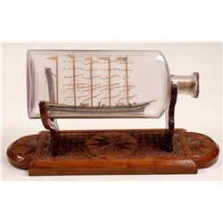 Ship in a Bottle with Wood Cradle   (106508)