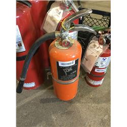 small orange fire extinguisher
