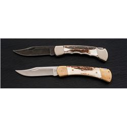 Lot of 2 Stag-Handled Buck 110 Knives