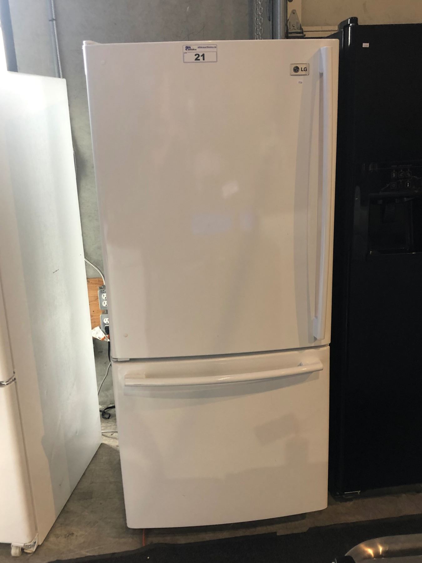 SCRATCH & DENT WHITE LG SWING OUT FRIDGE WITH ROLL OUT FREEZER - Able