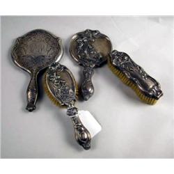 A THREE PIECE STERLING SILVER DRESSER SET Togethe