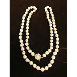 A STRAND OF BAROQUE CULTURED PEARLS