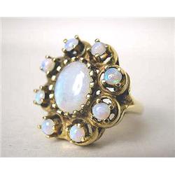 A 14K YELLOW GOLD AND OPAL RING