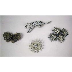 FOUR COSTUME JEWELRY BROOCHES,  INCLUDING KENNETH