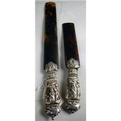 A PAIR OF SILVER MOUNTED TORTOISE SHELL PAGE TURN