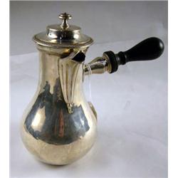 A CONTINENTAL SILVER COFFEE POT WITH SIDE WOODEN 