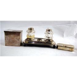 A SILVER PLATED INKSTAND WITH TWO GLASS INK POTS 