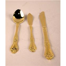 A GOLD COLOR STAINLESS STEEL FLATEWARE SERVING