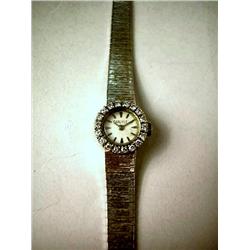 CARLYLE WHITE GOLD AND DIAMOND LADY'S WRISTWATCH,